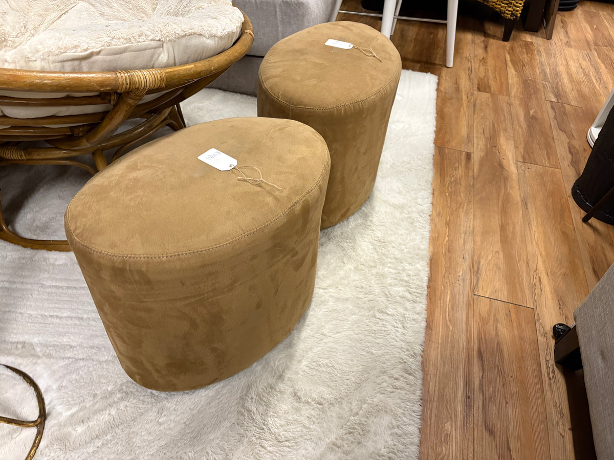 caramel faux-suede or leather round/oval accent ottomans! $(20 each)