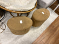 caramel faux-suede or leather round/oval accent ottomans! $(20 each)