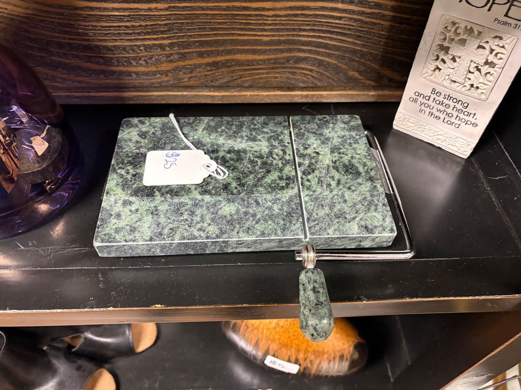 green marble cheese and butter slicer with a stainless steel wire cutter and matching stone handle